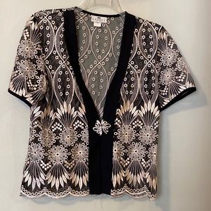 Sheena, sheer embroidered brocaded evening jacket, rhinestone clasp